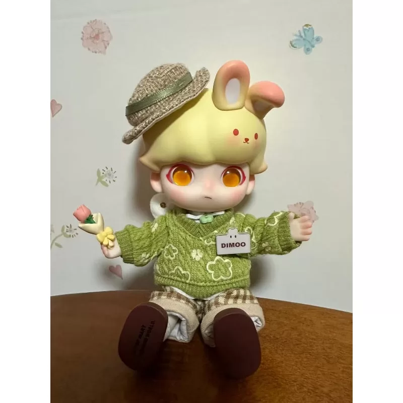 Figura de acción del conejo navideño DIMOO Figura de acción del conejo navideño DIMOO