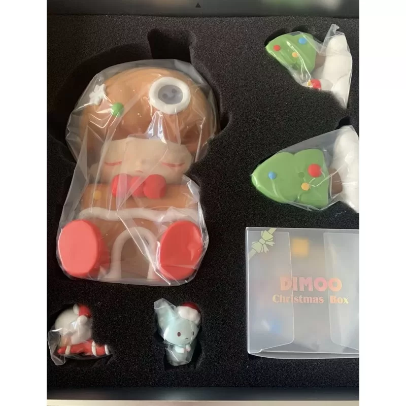 Figura limitada de la caja navideña de DIMOO